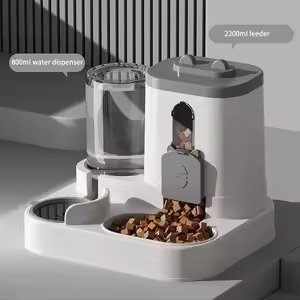PETMIREO Duo D03 gravity food and water dispenser showing both reservoirs PETMIREO Duo D03 gravity food and water dispenser showing both reservoirs